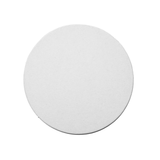 Two blank medium weight round coasters on a white table, next to a honey jar and a tea cup