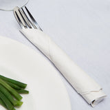 Blank 3-PLY White Lunch Napkin wrapped around a fork, next to a plate of beans on a white, wood table